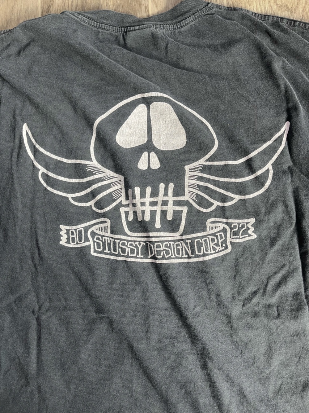 Vintage Stussy USA made pigment dyed Black Tshirt with White Skull Wings XXL
